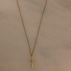 Gold cross necklace with small stone